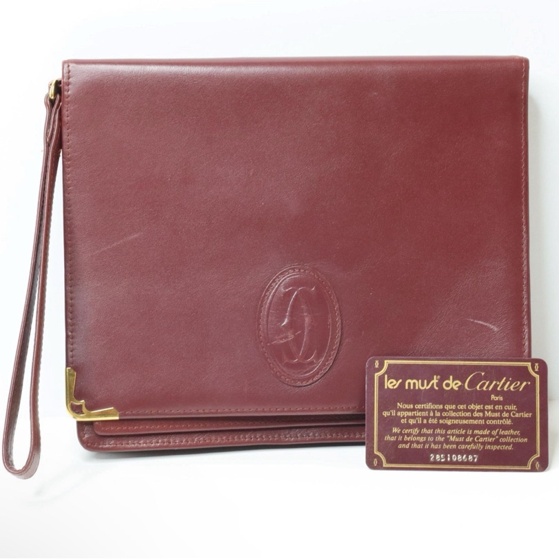 Cartier Wristlet With Original Authentication Card And Booklet